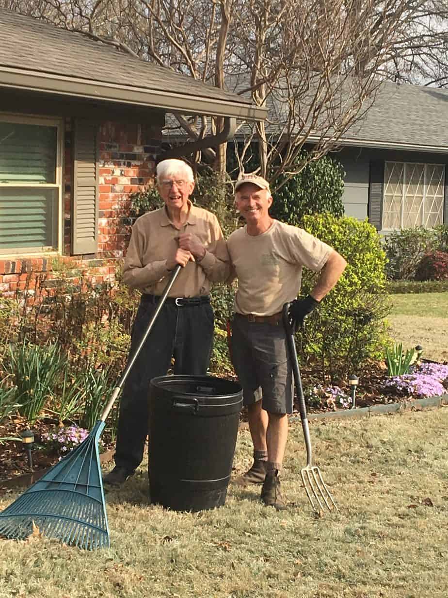 Dad and brother gardening